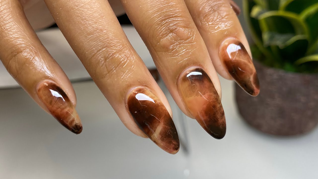 Unveiling the Secret to Sophisticated Nails: A Tortoiseshell Tale